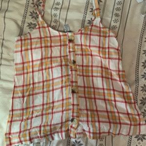 This is a plaid tank top from Arizona jean company it is a size small.